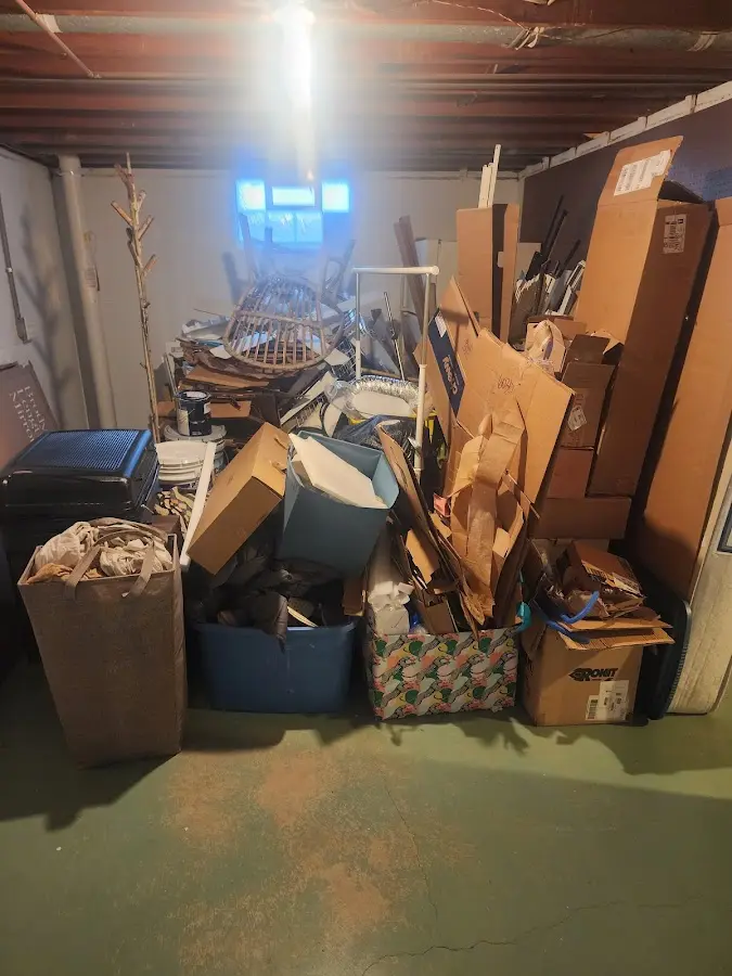 Roll-off dumpster container at job site for Yard Waste Dumpster Rental in Roxboro